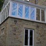 Rear of Raised Conservatory with Ground Level French Doors